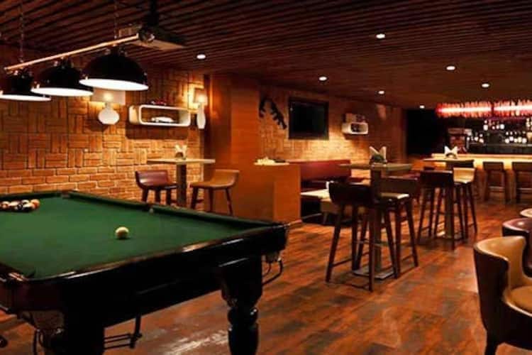 Billiard lounge at Lemon Tree Premier Delhi Airport, ideal for networking events.