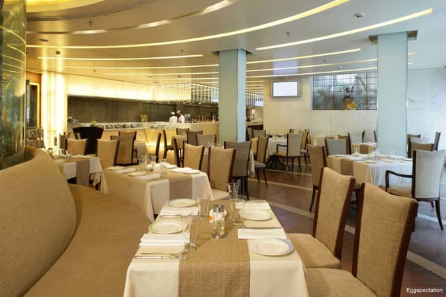 Modern cafe in Jaypee Siddharth, ideal for corporate meetings and private events.
