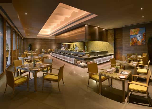 Modern meeting room at The LaLiT Mangar, ideal for events and gatherings.