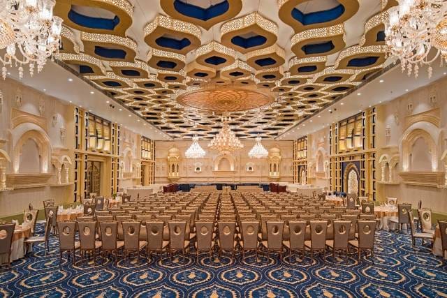 Banquet Hall in Fateh Prakash Palace with elegant chandeliers for conferences and banquets.
