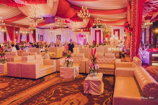 Elegant banquet hall in Chandigarh with vibrant floral decor, ideal for weddings and celebrations.