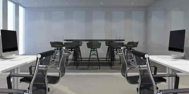 Modern conference room in Chandigarh with glass walls, ideal for corporate meetings.