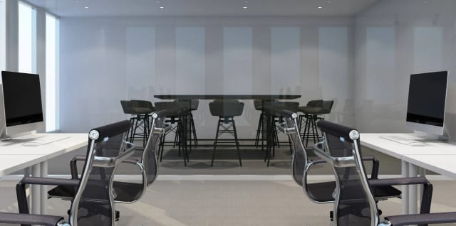 Modern conference room in Chandigarh with glass walls, ideal for corporate meetings.