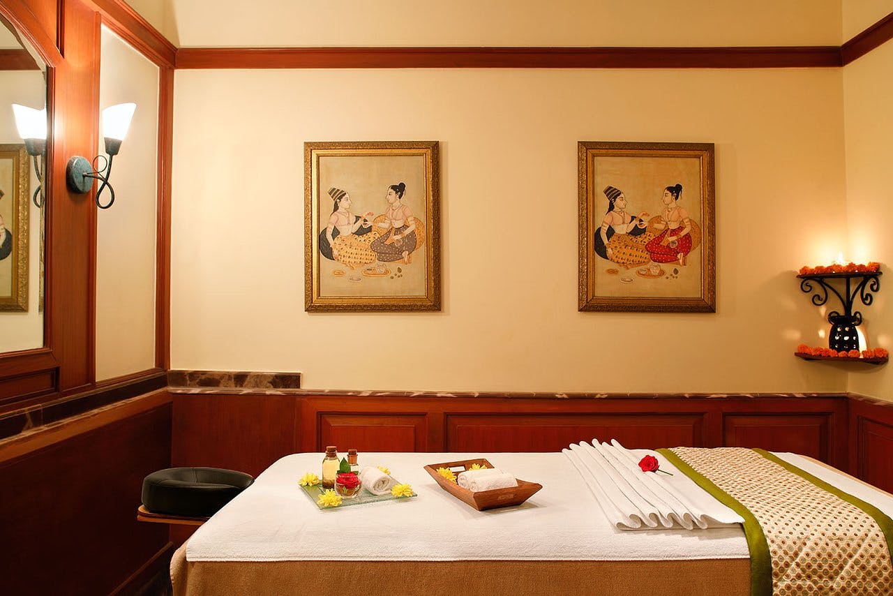 Serene spa treatment room in Amar Hall, Taj Hari Mahal for wellness retreats and relaxation.