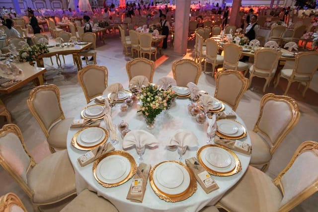 Elegant banquet table with fine china in Lemon Tree Premier Jaipur for formal events.