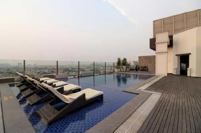 Rooftop infinity pool at DoubleTree Gurugram, ideal for upscale events and gatherings.
