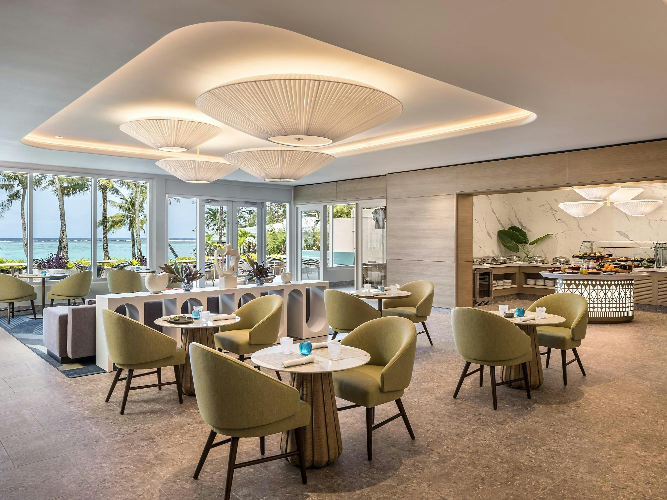 Modern conference room at Crowne Plaza Resort Guam with coastal view, perfect for events.