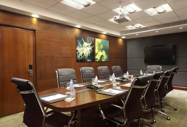 Modern conference room at Hilton Garden Inn New Delhi, ideal for corporate meetings.