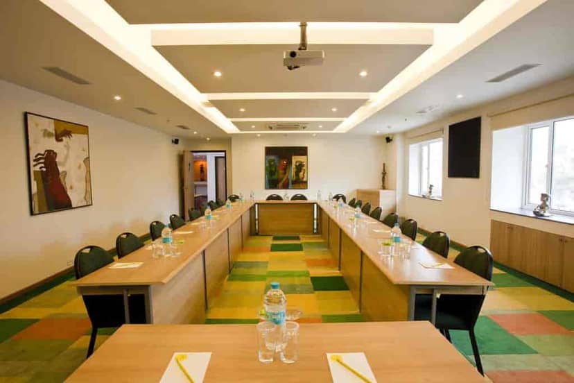 Conference center at Lemon Tree Hotel Kaushambi, U-shaped table, ideal for meetings and presentations.