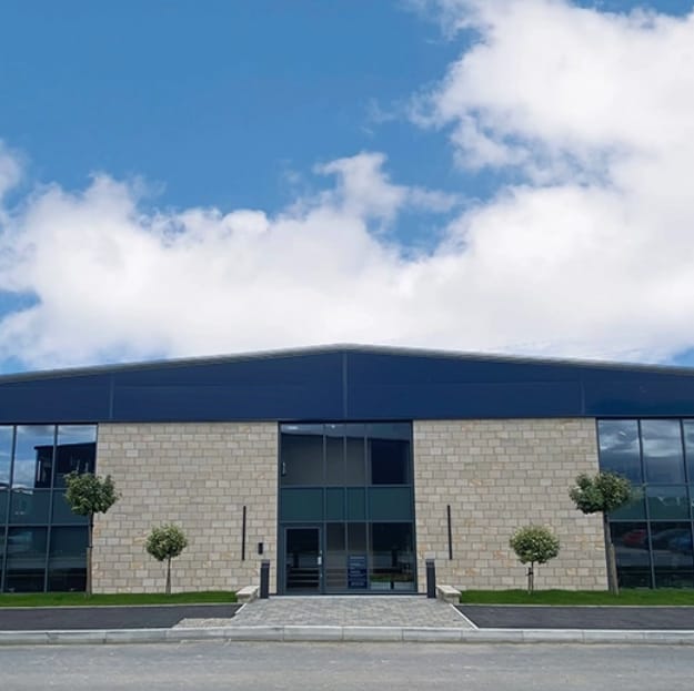 Modern conference suite with large windows, perfect for corporate meetings and events.