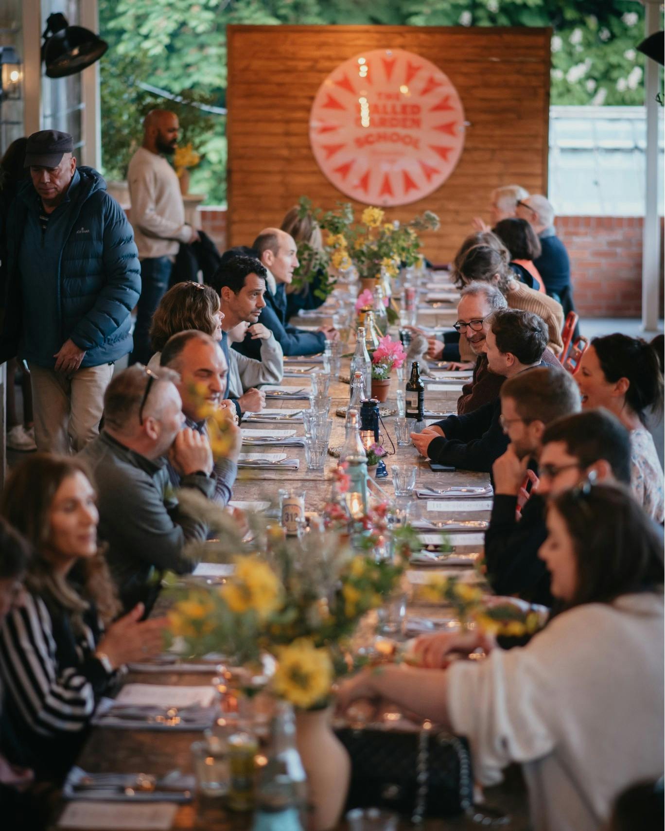 Long table set for networking event in The Walled Garden, Hawarden Estate.