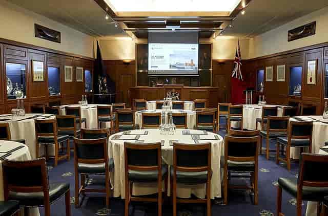 The Courtroom at HMS Wellington with wood panels, set for corporate events or banquet workshops.