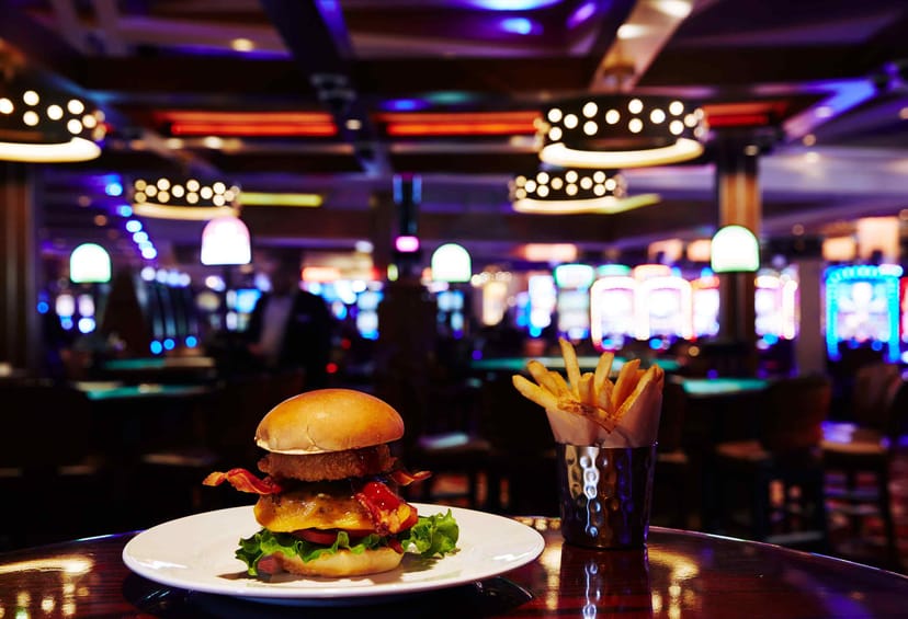 Gourmet burger and fries at Hard Rock Cafe, perfect for casual networking events.