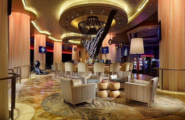Stylish Hard Rock Cafe lounge with elegant lighting, perfect for networking events.