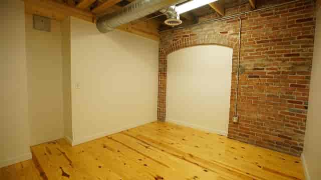 Fine Arts Gallery at Cider Gallery: minimalist event space with exposed brick, ideal for workshops.