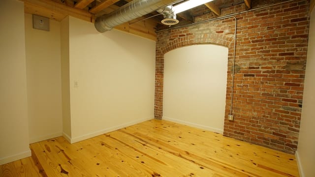 Fine Arts Gallery at Cider Gallery: minimalist event space with exposed brick, ideal for workshops.