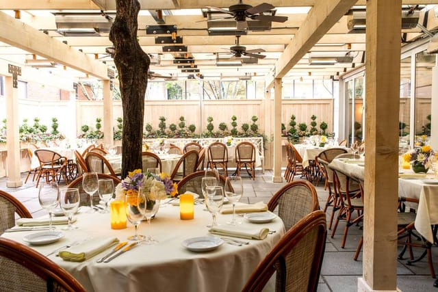 Elegant outdoor dining space at Harvest restaurant, perfect for events and celebrations.