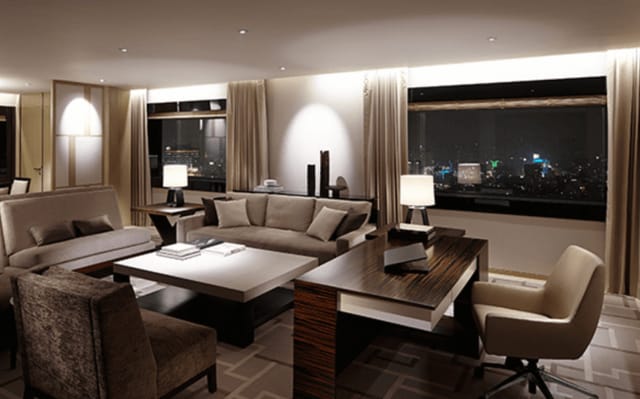 Sophisticated PRISMHALL meeting suite with modern decor and city view for events.