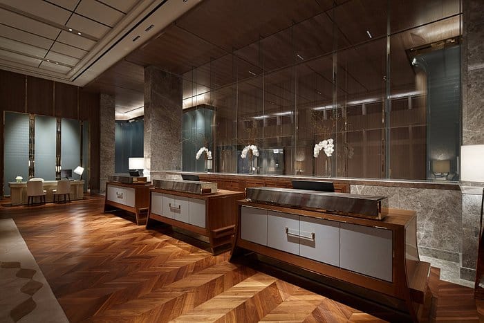 Elegant SIGNIEL Foyer in Seoul, featuring polished wood and marble for upscale events.