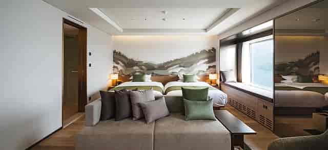 Modern hotel room at Walkerhill Hotels, ideal for business events and relaxation.