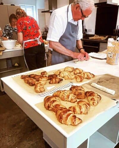Hands-on cooking class at Cambridge Culinary Arts, ideal for team-building events.
