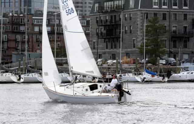 Sailboat in Boston Harbor for unique outdoor events and team-building activities.