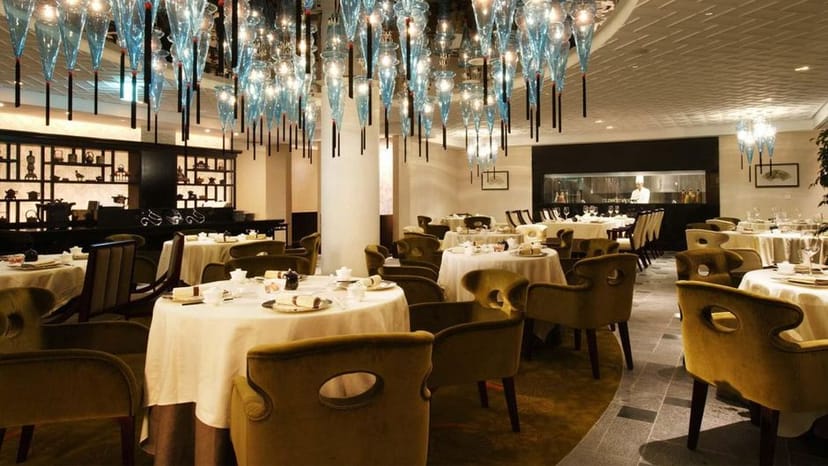 Elegant banquet space with chandelier for upscale events at LOTTE HOTEL WORLD.
