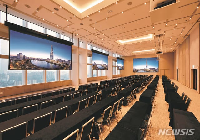 Modern conference room with panoramic windows for corporate meetings and seminars.