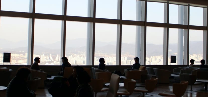 Serene meeting room with panoramic views, ideal for networking and collaboration events.