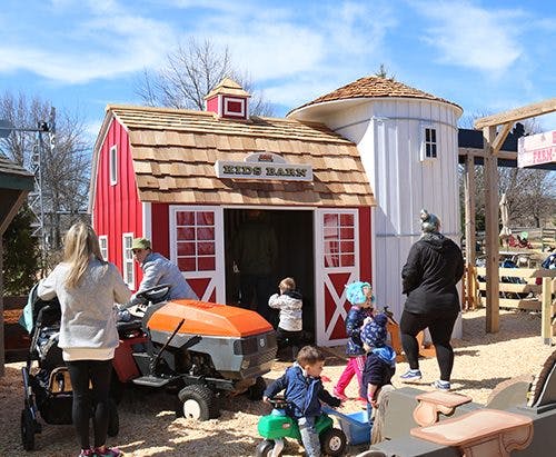 Adventureland at Davis Farmland: vibrant red barn venue for children's parties and community events.