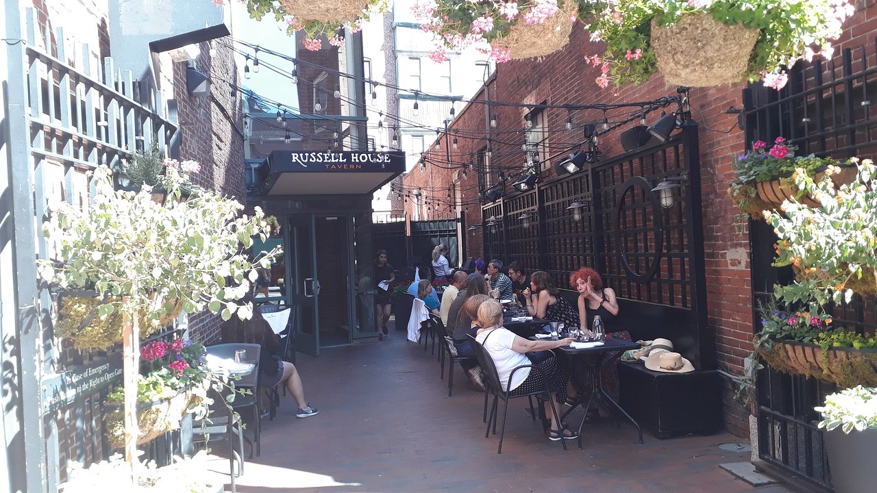 Charming outdoor dining at Russell House Tavern, perfect for casual events and gatherings.