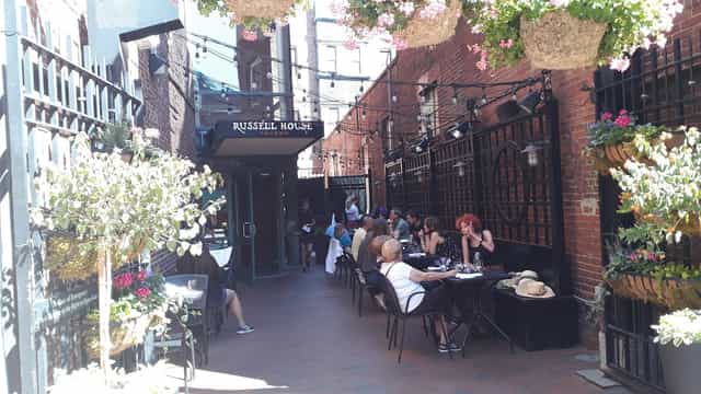 Charming outdoor dining at Russell House Tavern, perfect for casual events and gatherings.