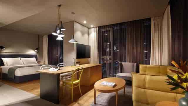 Modern hotel suite in L7 HONGDAE, ideal for business meetings and gatherings.