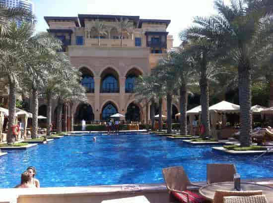 Luxurious resort pool at Palace Hotel Downtown, ideal for upscale events and meetings.