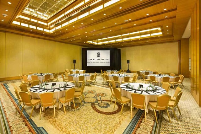 Elegant ballroom at The Ritz-Carlton Dubai for corporate meetings and banquets.