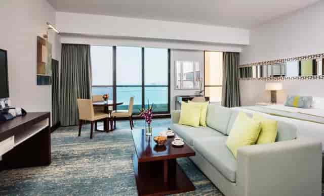 Meeting room at JA Ocean View Hotel with natural light, perfect for executive retreats.