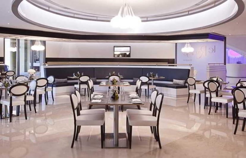 Modern conference hall at JA Ocean View Hotel, ideal for meetings and events.
