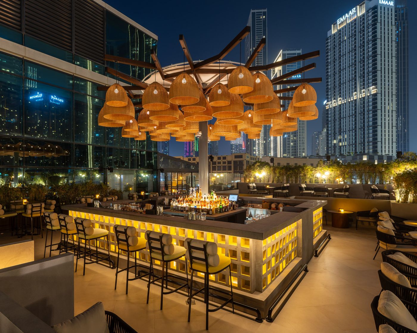 Rooftop lounge at Taj Dubai with hanging lights, ideal for cocktail receptions and events.