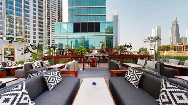 Rooftop lounge at Taj Dubai with chic seating, ideal for upscale events and cocktail parties.