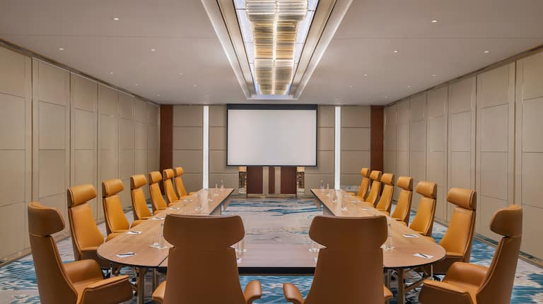 Banquet hall at Hilton Dubai: modern conference room for corporate events.
