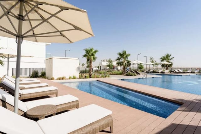 Birdie by the pool at Radisson Hotel Dubai, ideal for casual meetings and networking events.