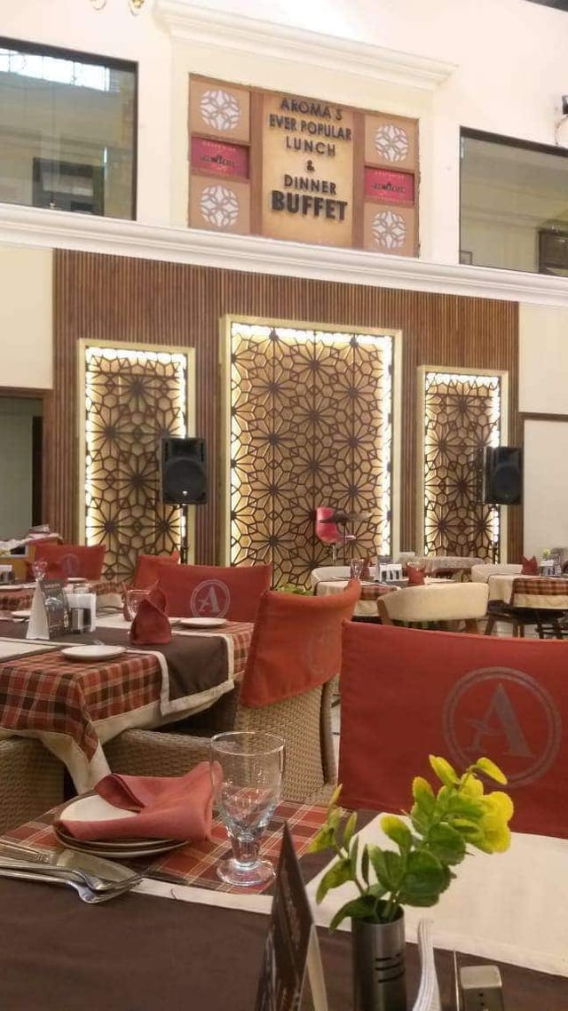 Rooftop bar at Hotel Aroma with elegant decor, perfect for events and meetings.