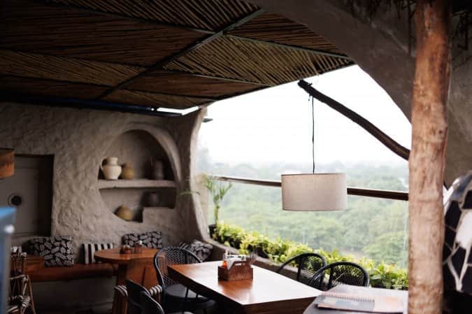 Rooftop bar at Hotel Aroma, modern decor, ideal for events and meetings.