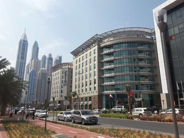 Al Sofouh at Radisson Blu, Dubai: modern venue with palm trees for corporate events.