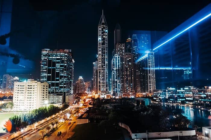 Al Sofouh skyline at night, vibrant lights for corporate events in Dubai.