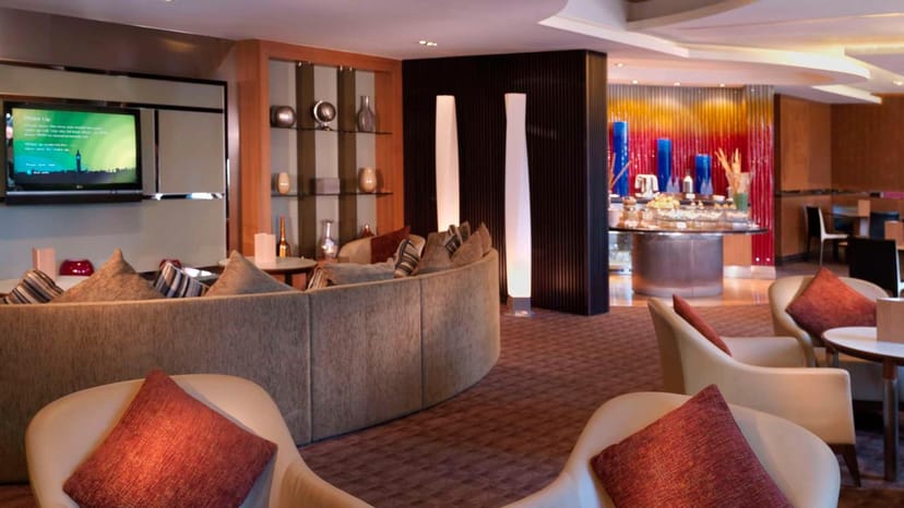 Small meeting lounge at Radisson Blu Hotel, Dubai - modern design, ideal for networking events.