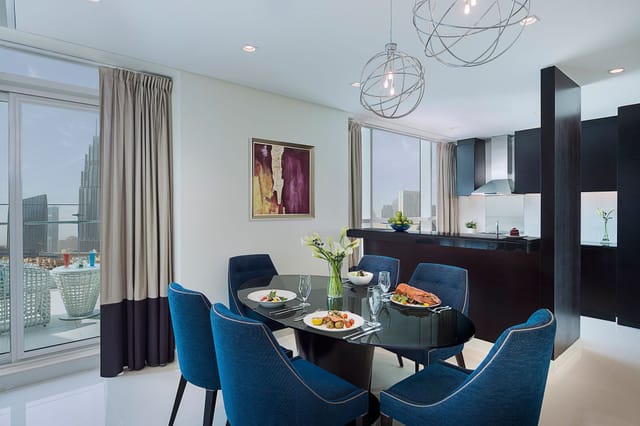 Modern conference room with elegant table, ideal for networking dinners and small events.
