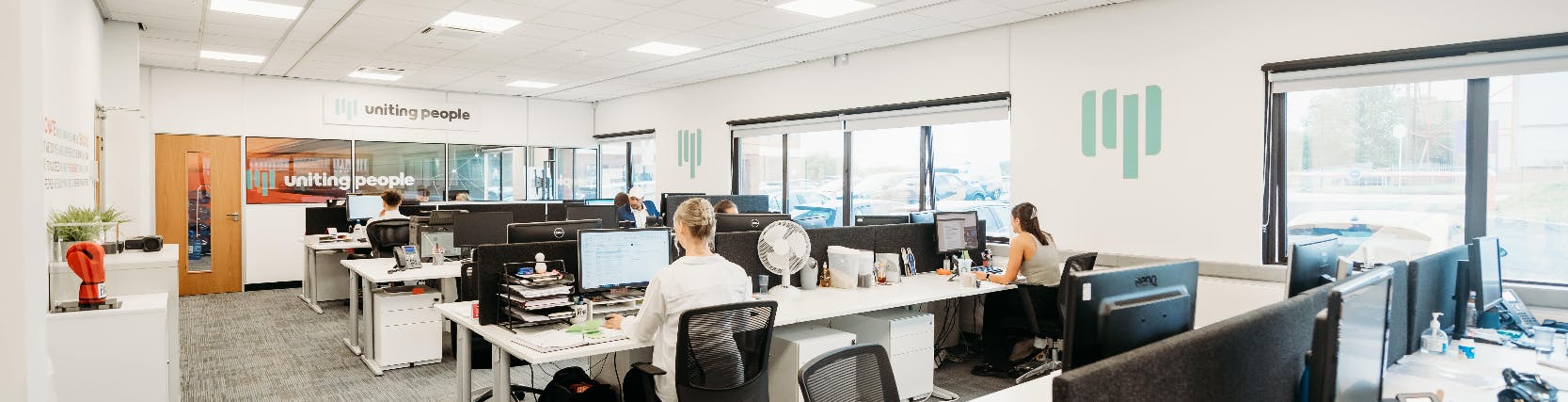 Modern office workstations in BusinessLodge Stoke, ideal for corporate meetings and workshops.
