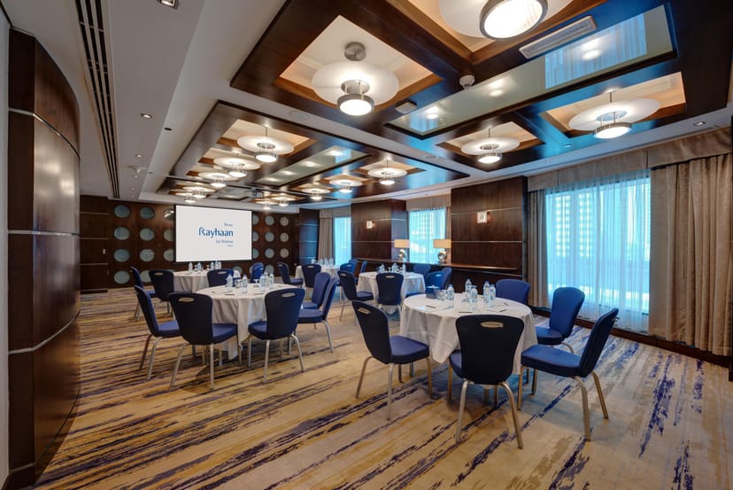 Meeting room at Rose Rayhaan by Rotana, ideal for corporate events and presentations.