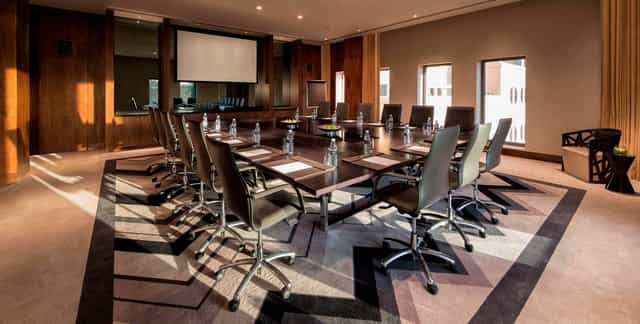 Conference Hall in Pullman Dubai, modern meeting room for professional events and presentations.